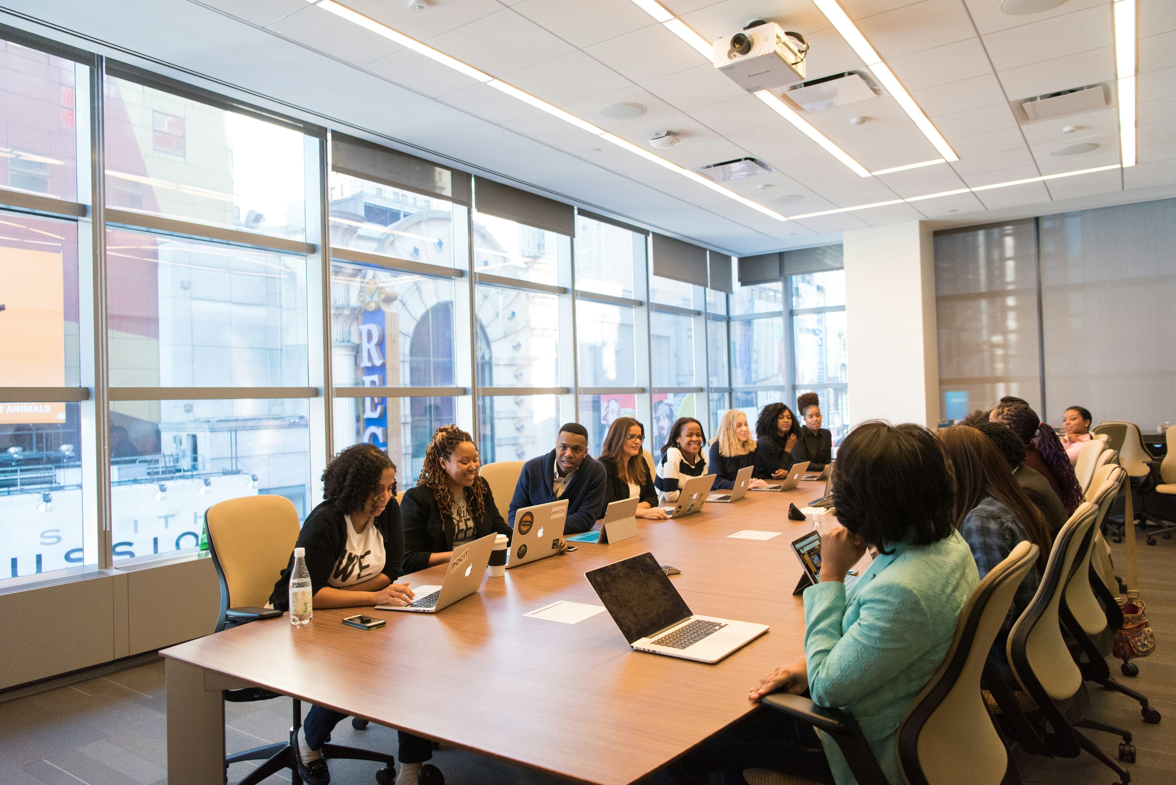 A professional meeting in a warm, collaborative room